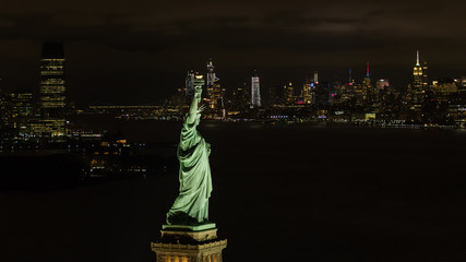 Aerial night image of the Statue of LIberty New York City © Felix Mizioznikov