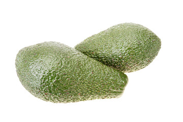 Two emerald green avocado