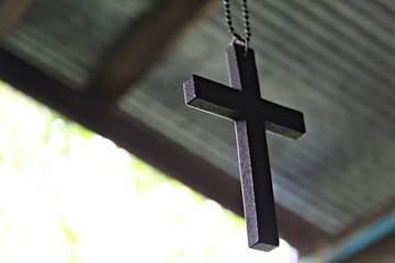 Wooden Christian cross background. Christianity symbol. Christianity Concept. Faith hope love concept.