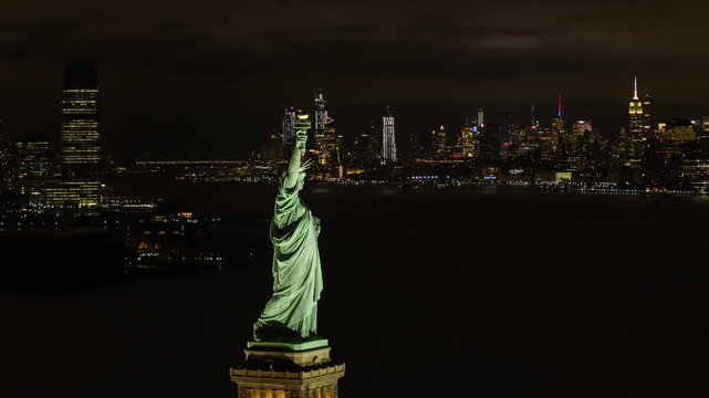 Aerial night image of the Statue of LIberty New York City