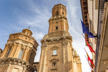 Cathedral tower and flags in the historic center of Tudela, Spain