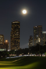 Fototapeta na wymiar Moonlight over Downtown Houston Texas