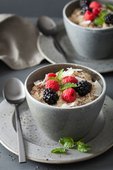 healthy breakfast oatmeal porridge with raspberry blackberry