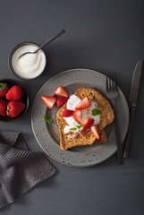 french toasts with yogurt and strawberries for breakfast