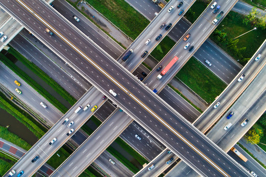 Look down view of traffic cross intersection road with vehicle movement