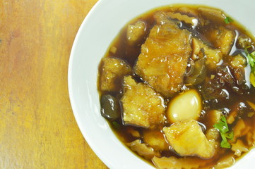braised fish maw in red gravy on bowl