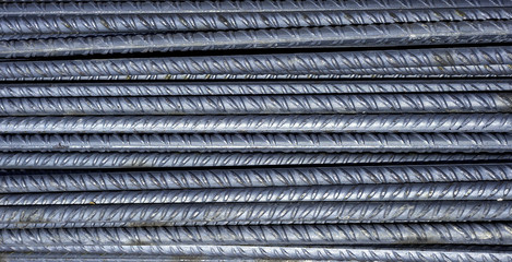 steel background, steel construction, construction irons for building, stack of ribbed steel
