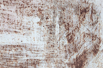 texture of rusty iron, cracked paint on an old metallic surface, sheet of rusty metal with cracked and flaky paint, abstract rusty metal texture.