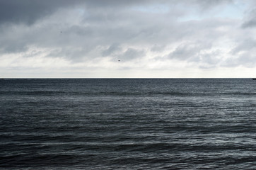 Sky clouds and ocean landscape. Dramatic, travel