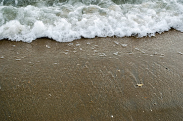 Water waves at beach. Coastline, travel.