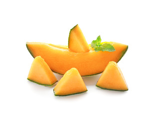 Pieces of tasty cut melon on white background