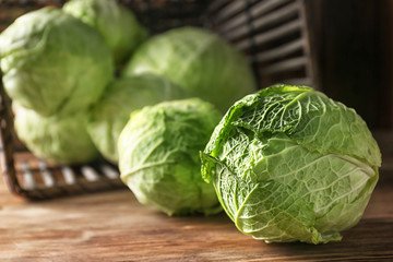 Fresh cabbage on wooden table