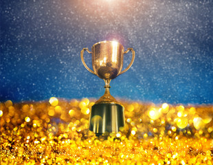 winner cup with abstract background. copy space ready for your winner design..