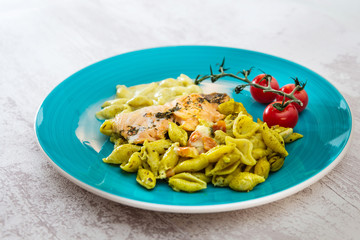 tasty pasta with salmon on a the table