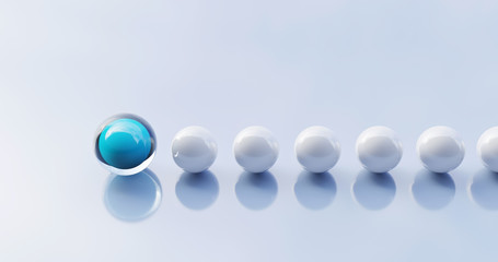 Weiße Kugeln folgen einer blauen Kugel. Symbol für ein Team dass einem Anführer folgt.
