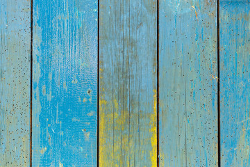Fototapeta na wymiar Old painted boards for use as a background