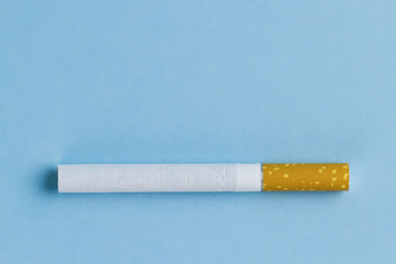 cigarette on blue background