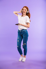 Full length portrait of a cheerful young girl