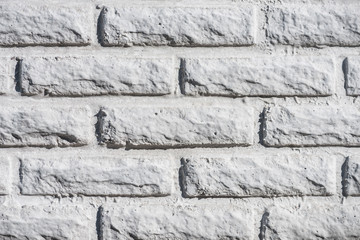close-up view of white aged brick wall background