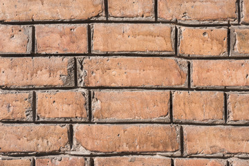 close-up view of brown aged brick wall background