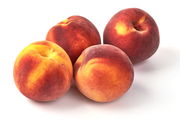 Fresh ripe juicy peaches, isolated on white background.