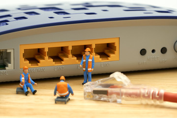Miniature people Construction worker LAN connection Or connect to the internet. Communication ideas, maintenance.