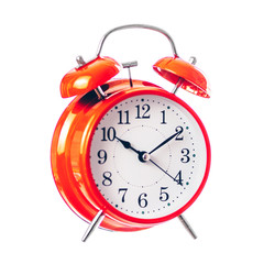 Red vintage alarm clock isolate on white background