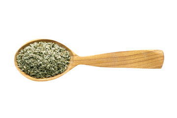 sage dried in wooden spoon isolated on white background. spice for cooking food, top view.