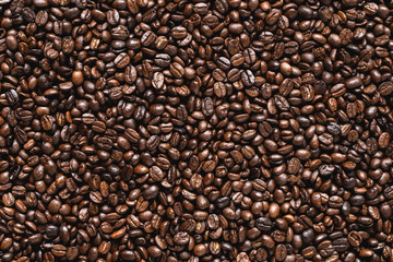 Quality coffee beans Roasted Medium background

