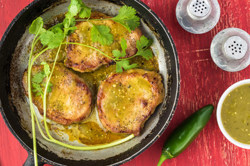 Pork chops in salsa verde.