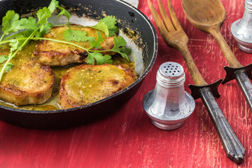 Pork chops in salsa verde.