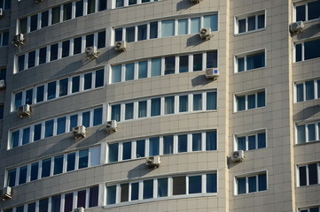 Obraz premium building and air-conditioners on the facade