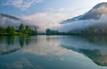 Amazing view of reservoir on Soca river near Most na Soci, Slovenia at foggy morning