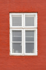 Window on the colorful facade