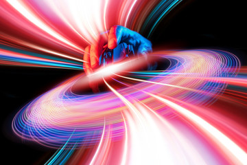 Close up of Hand over wireless Game Mouse on dark background ; The finger ready to click