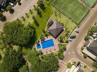 Fototapeta na wymiar An aerial view of houses of a gated community un Guayaquil, Ecuador. Shot with a drone in a sunny day.