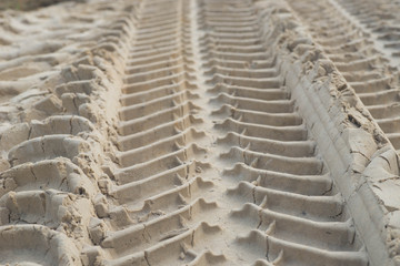 tractor tyre imprints in sand