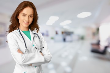 Young nurse woman with stethoscope at hospital