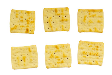 six roasted biscuits of uneven shape without sugar isolated on white background