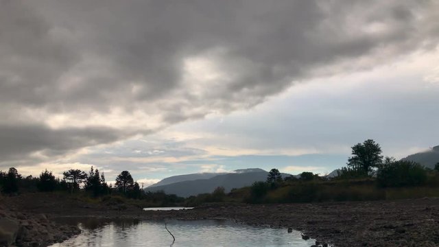 Clouds passing next to cautin river