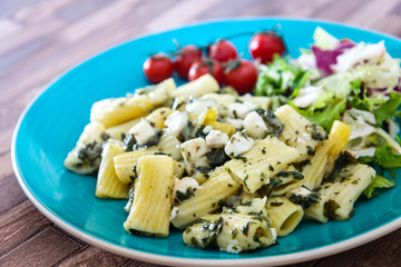 tasty pasta Rigatoni with Spinach and Goat Cheese