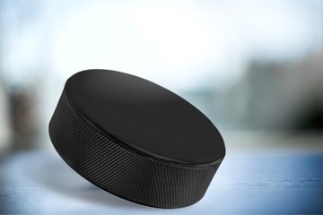 Realistic hockey puck isolated