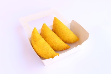 Traditional empanadas, colombian breaded wrap made by folding dough over a stuffing, which may consist of meat, cheese, or other ingredients.
