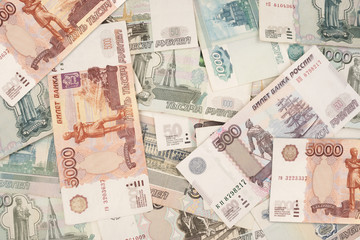 Russian banknotes in denominations of 1000, 500, 100 and 5000 rubles close-up