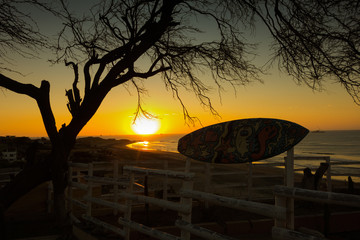 Sunset and Surfboard in Lobitos, Peru 
