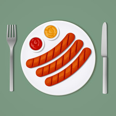 Three grilled sausages with ketchup and mustard on a white plate with fork and knife. Top view.
