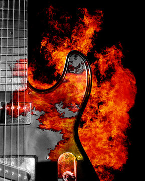 Electric guitar on fire on a black background