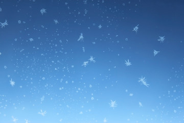 Christmas frost on blue sky