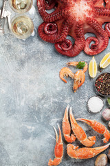 Obraz na płótnie Canvas Seafood and wine. Octopus, lobster, shrimps