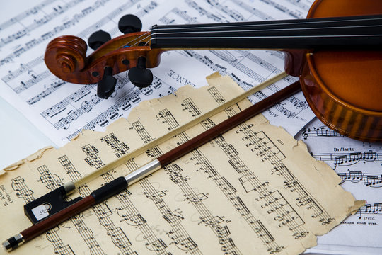 Violin, bow and notes. Musical composition